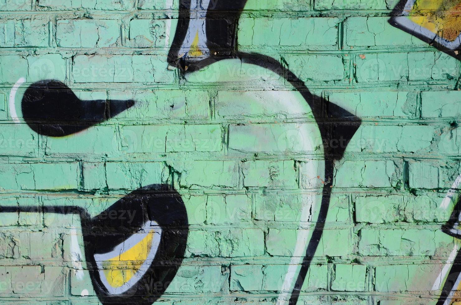 The old wall, painted in color graffiti drawing blue aerosol pai photo