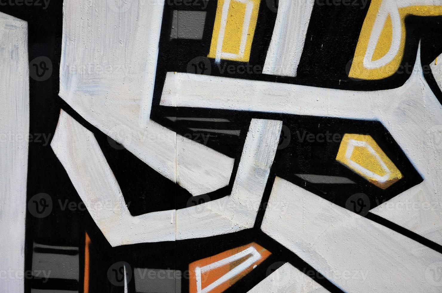 Background image of the wall decorated with colorful abstract graffiti. Street art concept photo