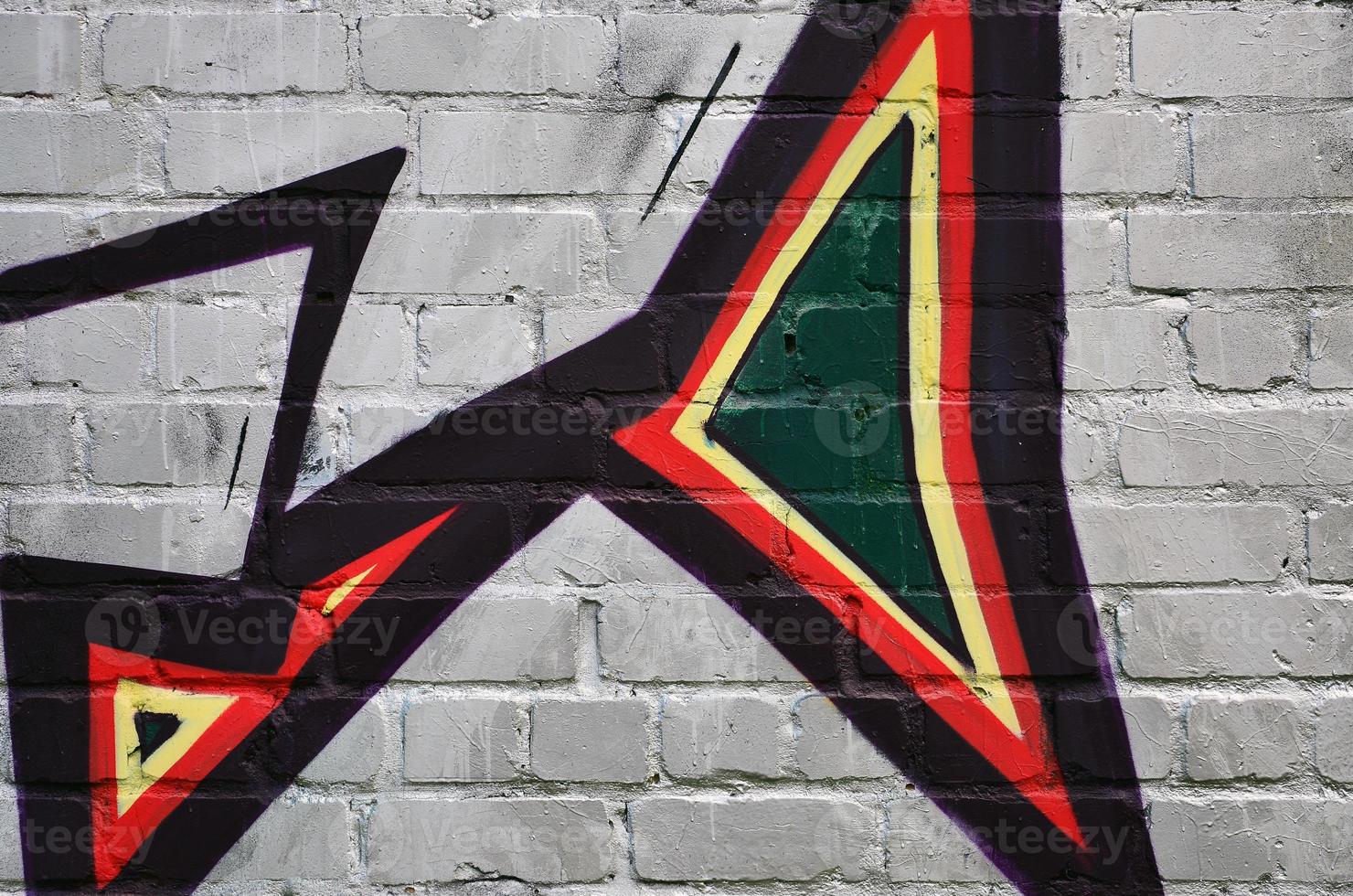 Background image of the wall decorated with colorful abstract graffiti. Street art concept photo