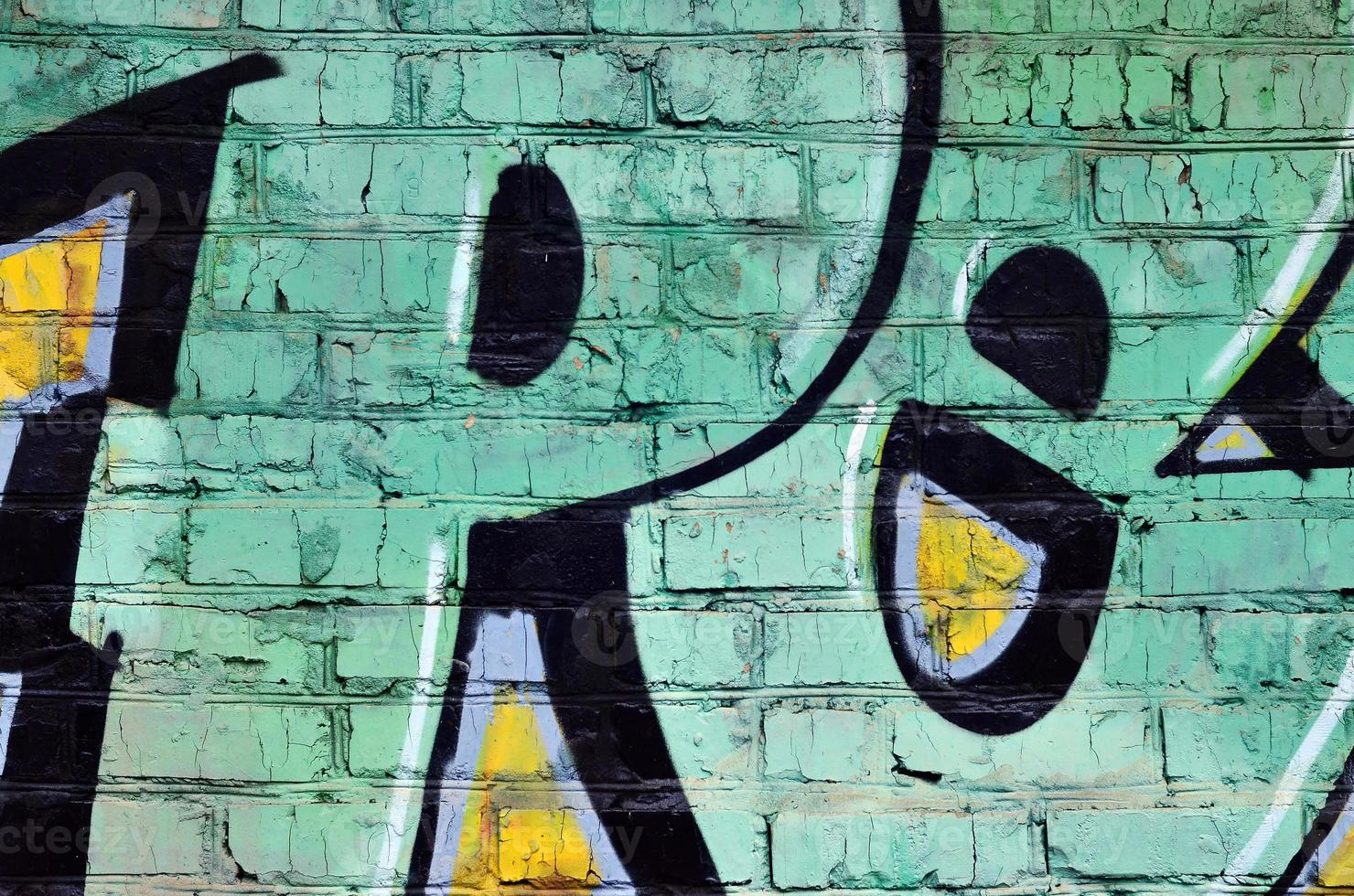 Beautiful street art graffiti. Abstract color creative drawing fashion colors on the walls of the city. Urban Contemporary Culture. Title paint on walls. Culture youth protest photo