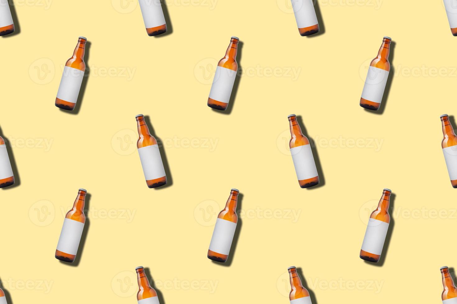 Beer bottle seamless pattern on yellow background photo