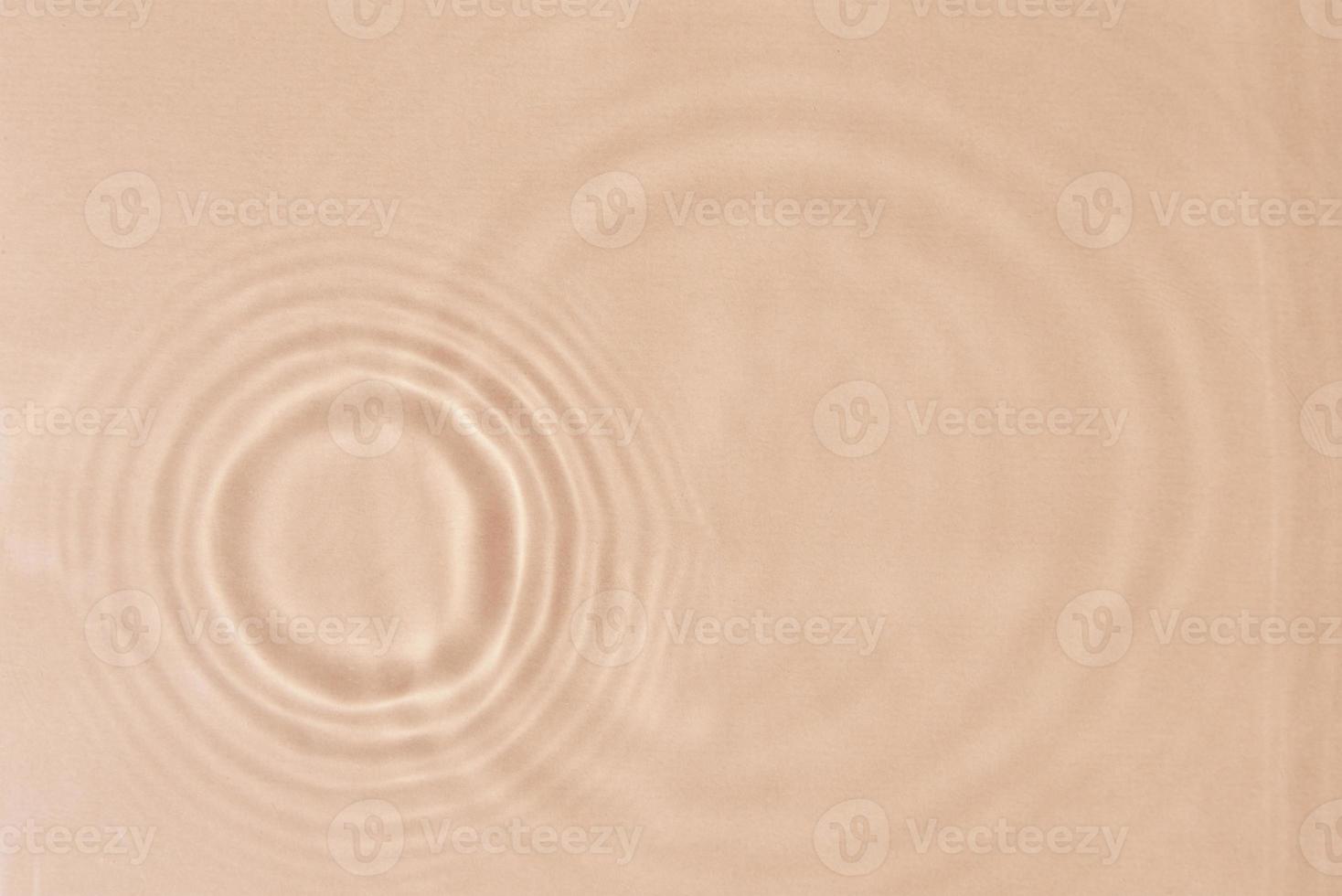 Beige water texture background. Abstract pattern photo