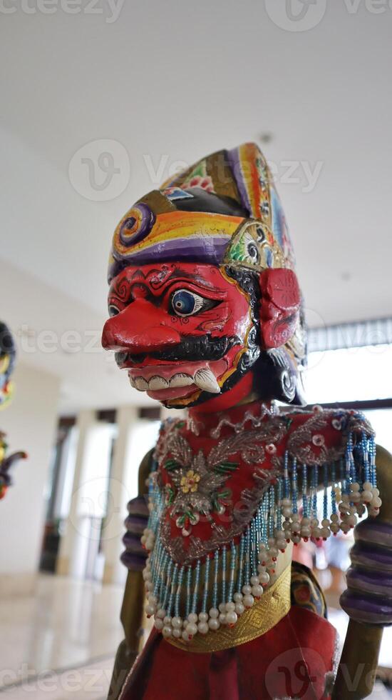 Indonesian authentic wayang golek, wooden carved rod puppet. photo