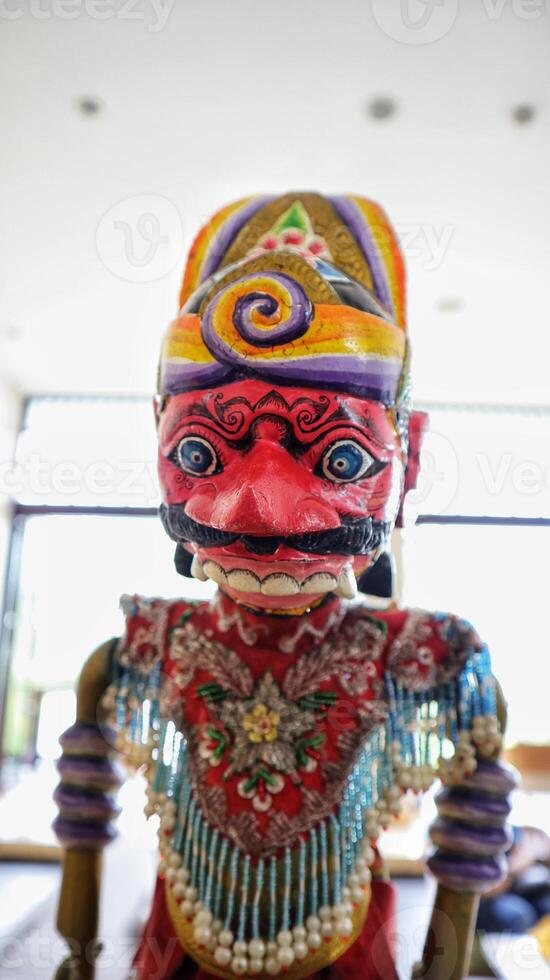 Indonesian authentic wayang golek, wooden carved rod puppet. photo