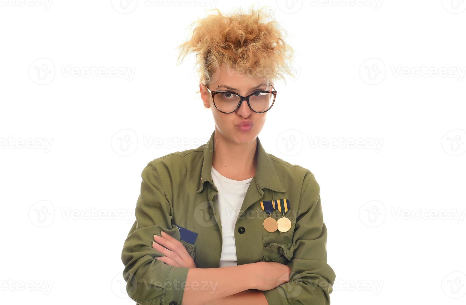 beautiful modern blonde woman with eye glasses posing over a white background photo