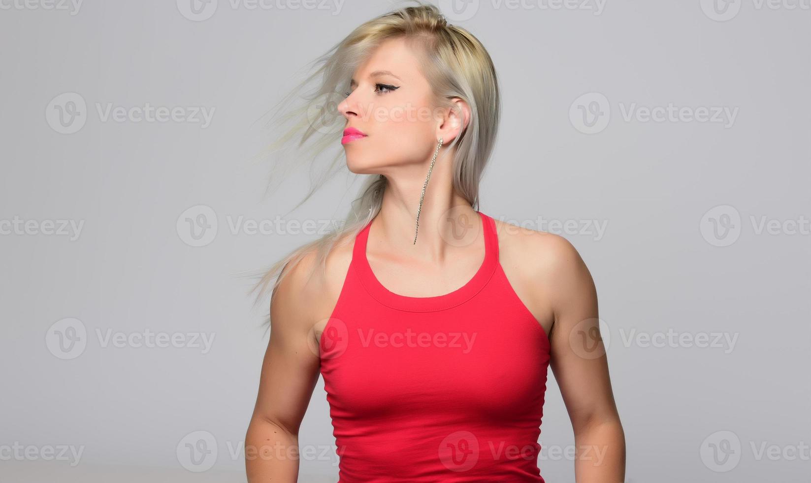 Happy satisfied woman with flying hair photo