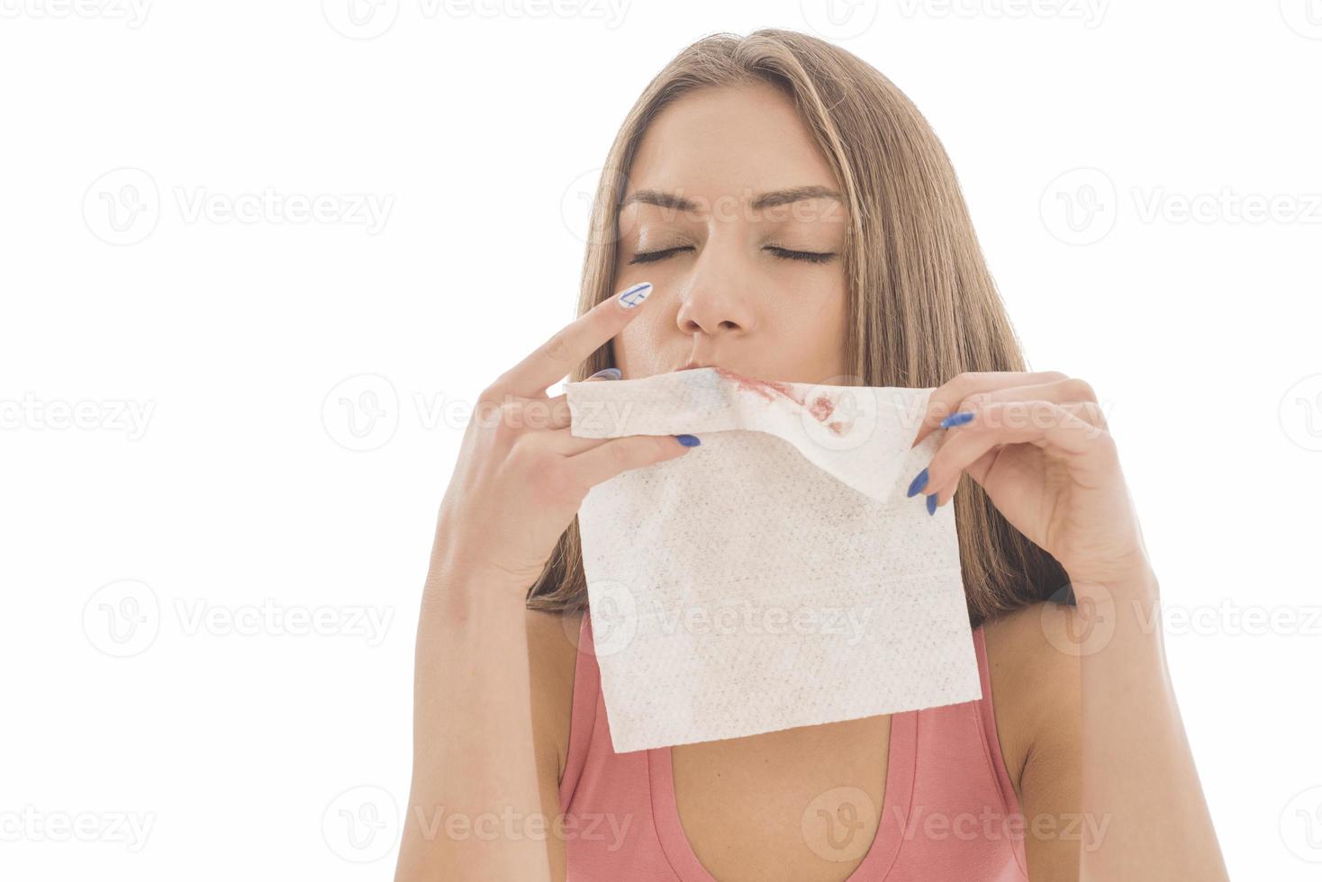 Beautiful woman sitting in front of a mirror. face of a healthy woman applying cream and makeup. Advertisement for skin cream, anti-wrinkle cream, baby face photo