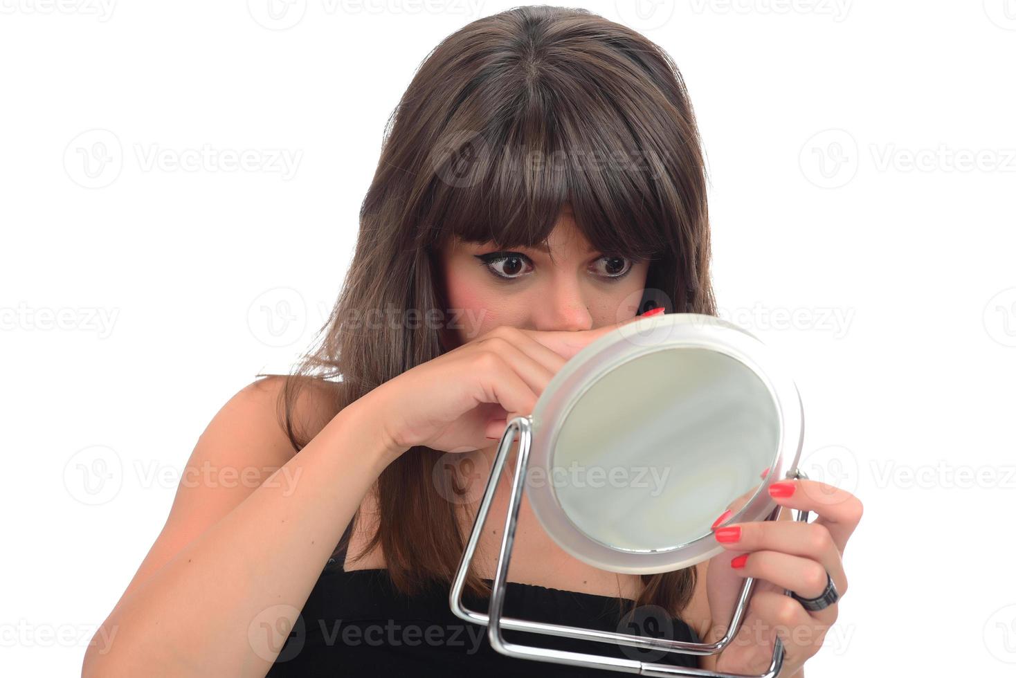 Portrait of attractive delicate feminine cheery girl touching smooth silky skin photo