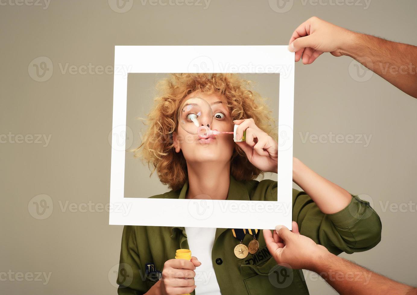 woman in picture frame blowing bubbles 17010961 Stock Photo at Vecteezy