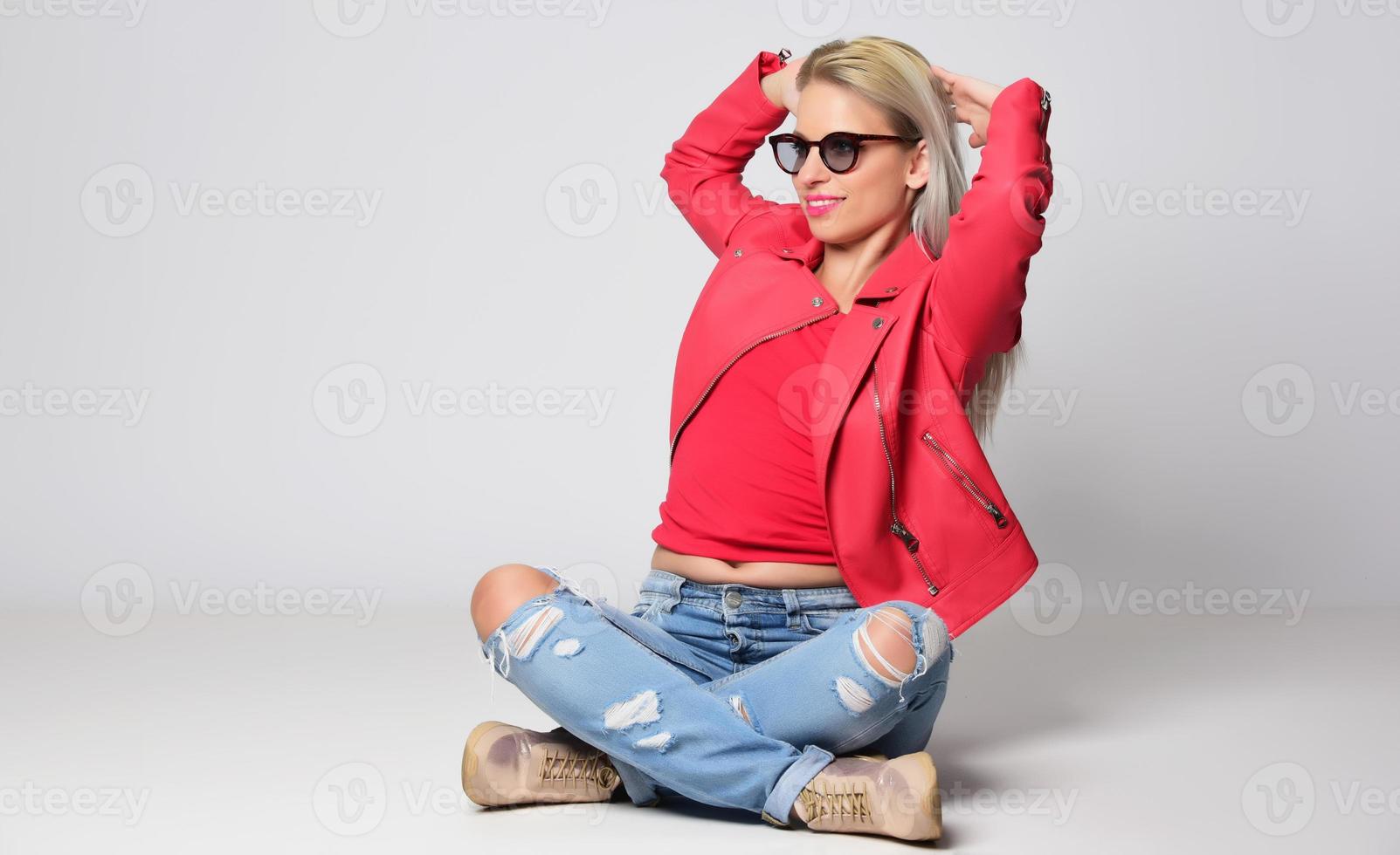 The woman is grabbing her hair. photo