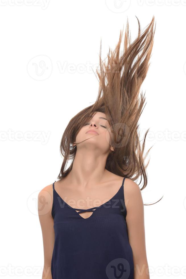 Happy satisfied woman with flying hair photo