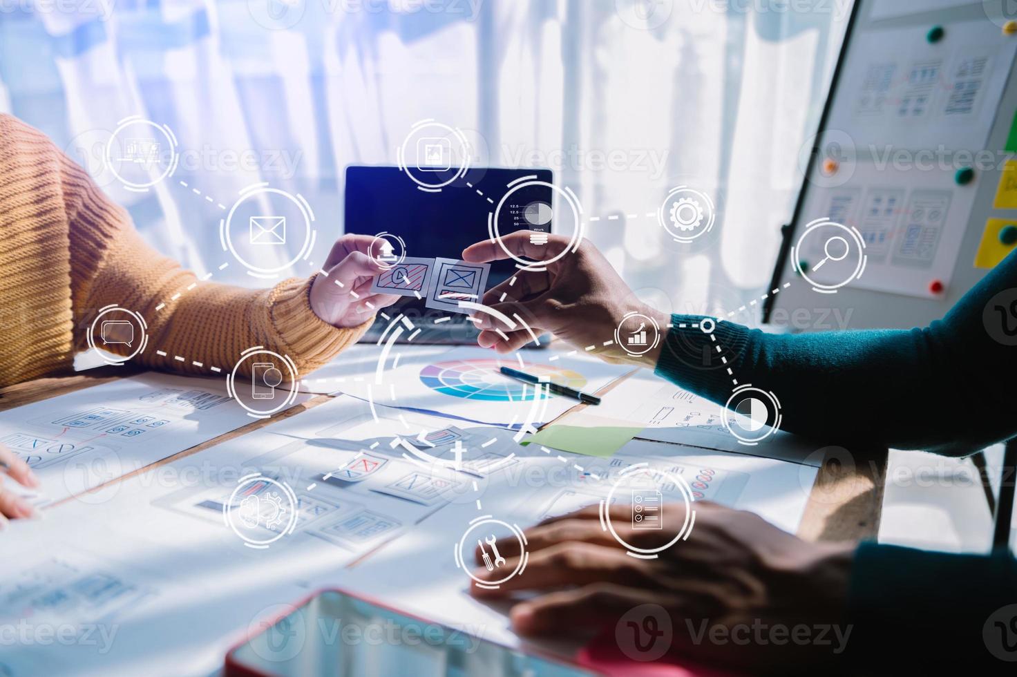 UX graphic designer planning application process development prototype wireframe for web smart phone. Creative digital development agency. photo