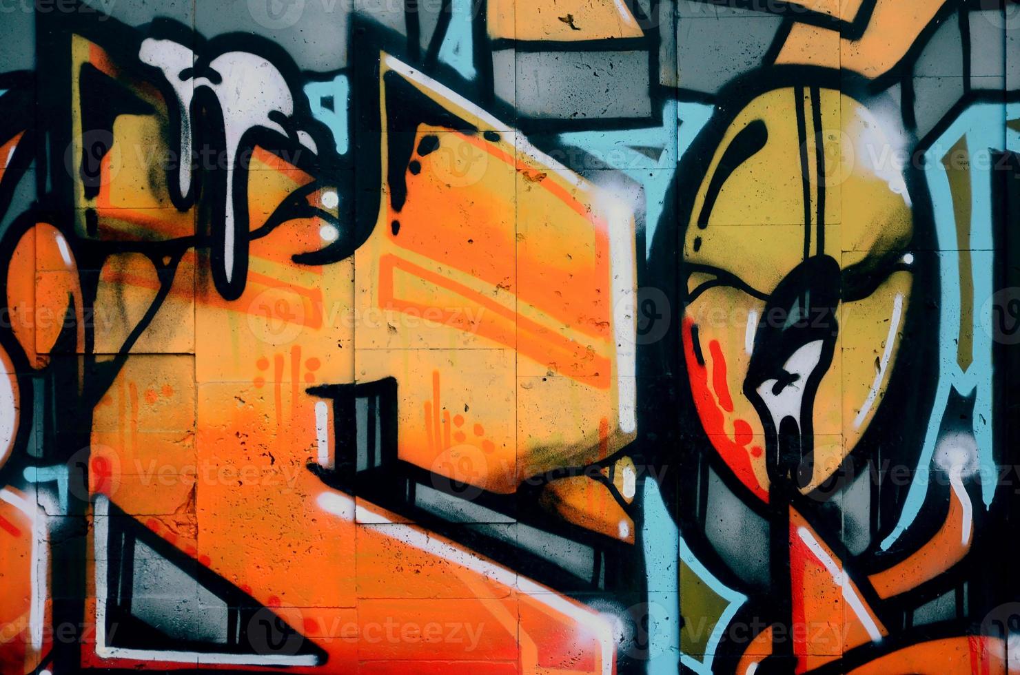 A fragment of detailed graffiti of a drawing made with aerosol paints on a wall of concrete tiles. Background image of street art in warm red color tones photo