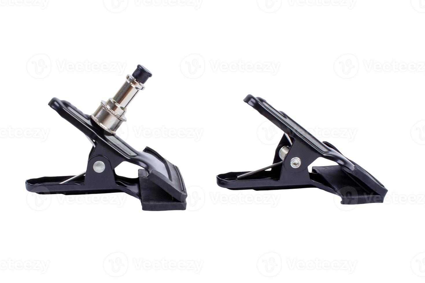Carpentry clamps on the white background photo
