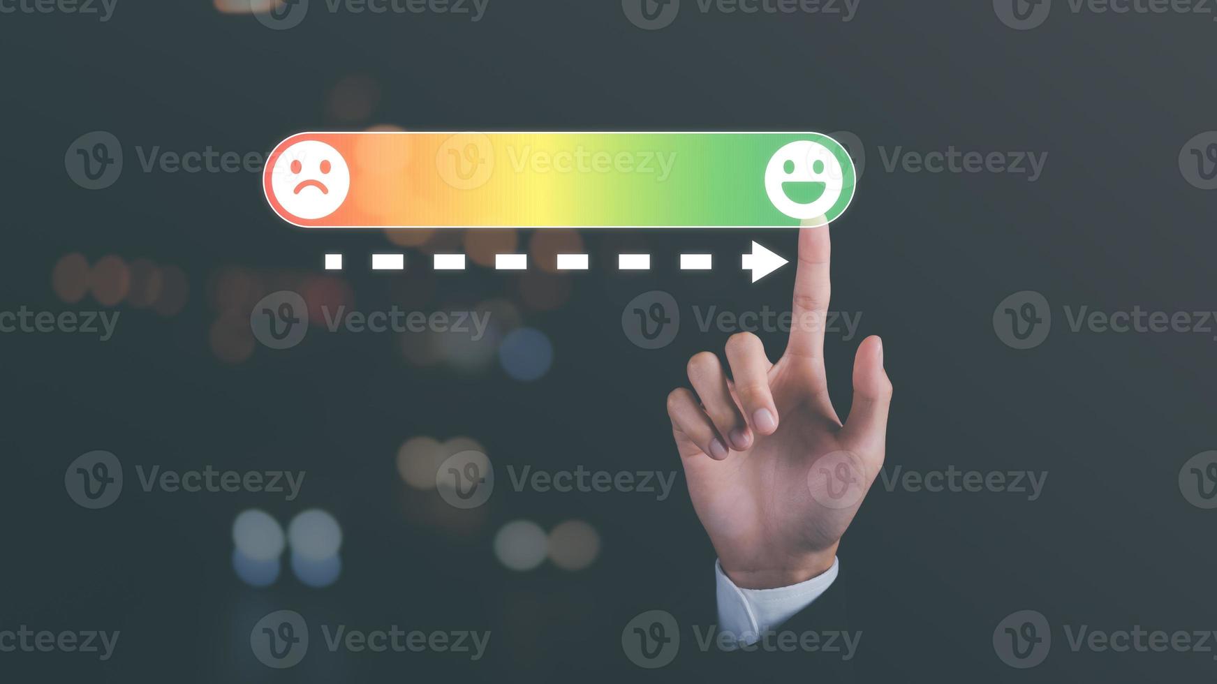 customer service and satisfaction concept,Businessman hand touching virtual screen on happy smiley face icon to give service satisfaction ,very impressive score,Evaluation and Audit photo