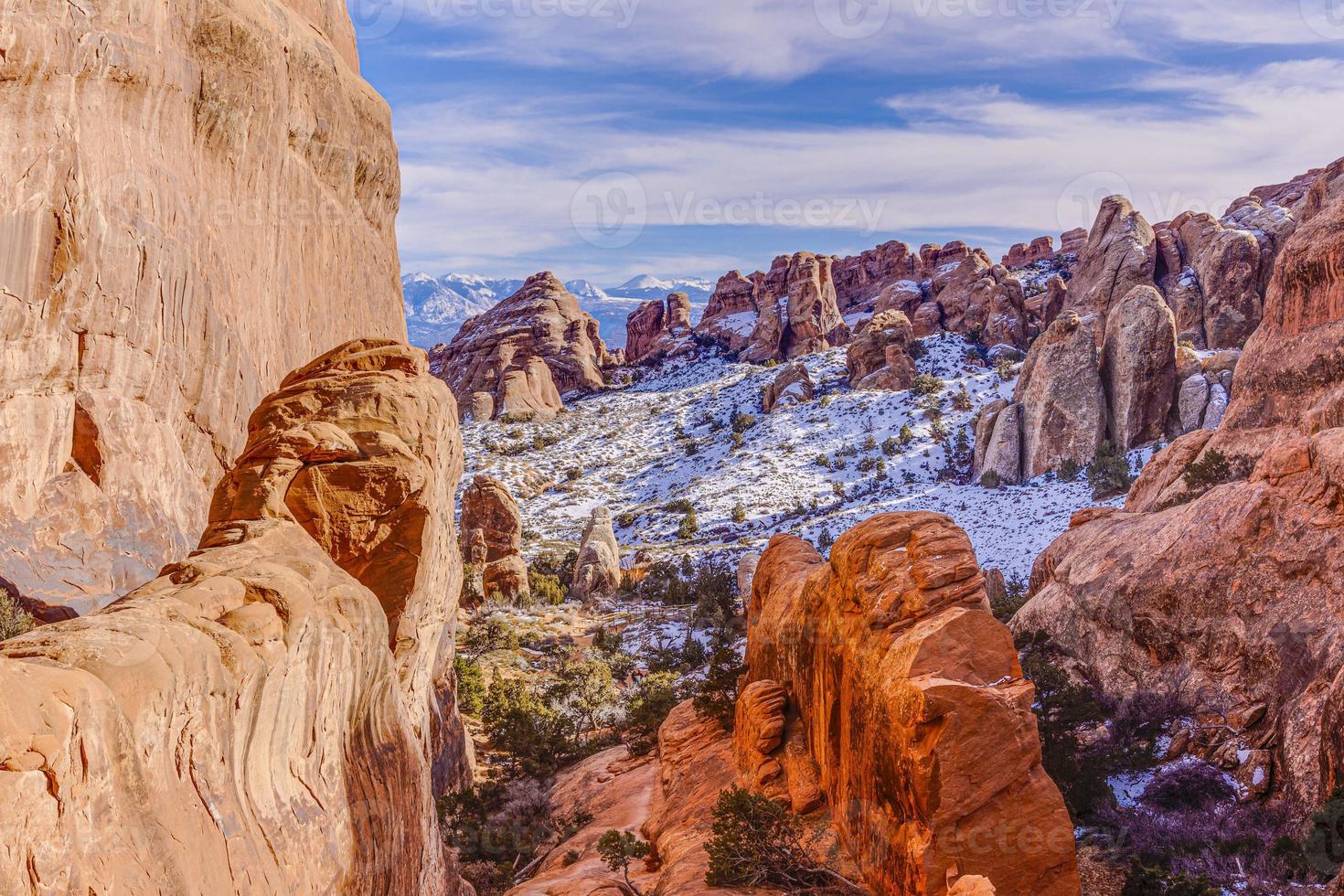 Panoramic picture of natural and geological wonders of Arches national park in Utah in winter photo