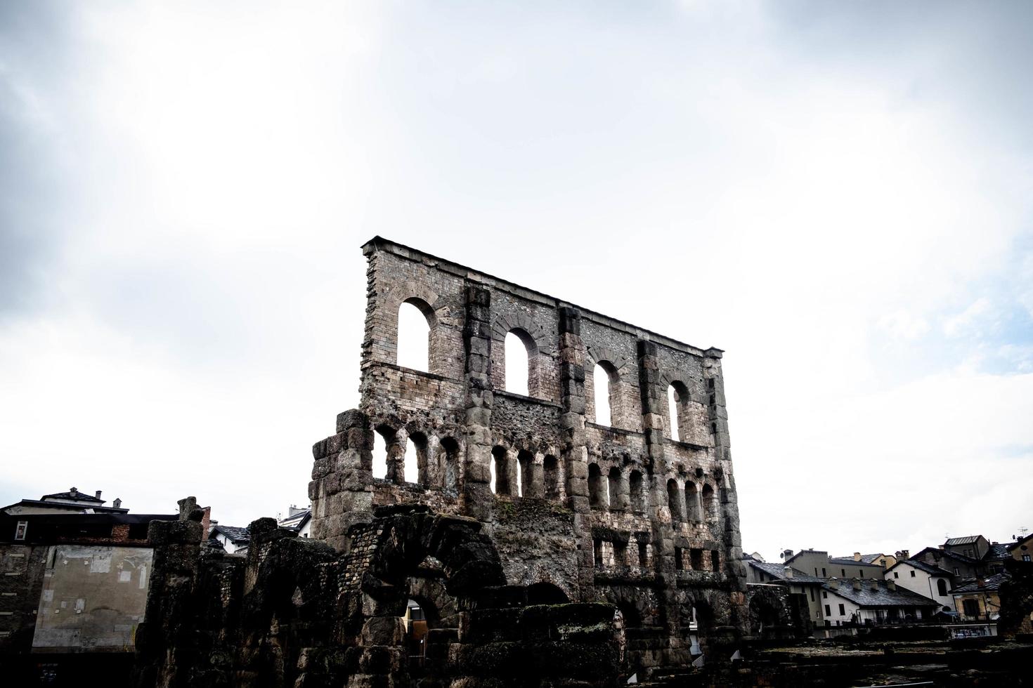 the remains of the beautiful Roman theater of Aosta, during a winter day in December 2022 photo