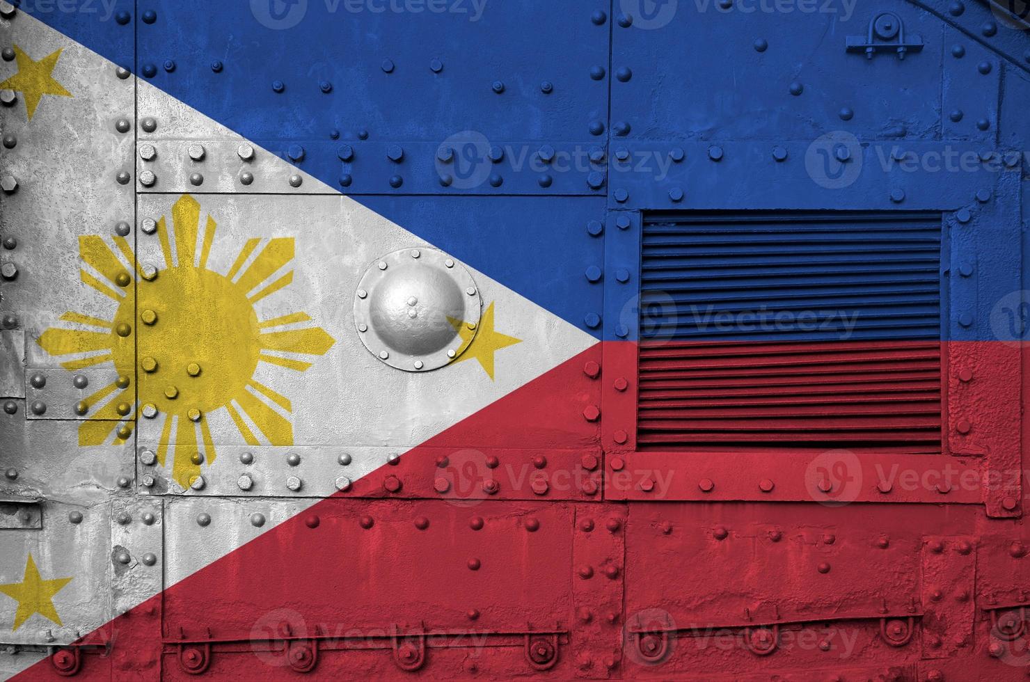 Philippines flag depicted on side part of military armored tank closeup. Army forces conceptual background photo