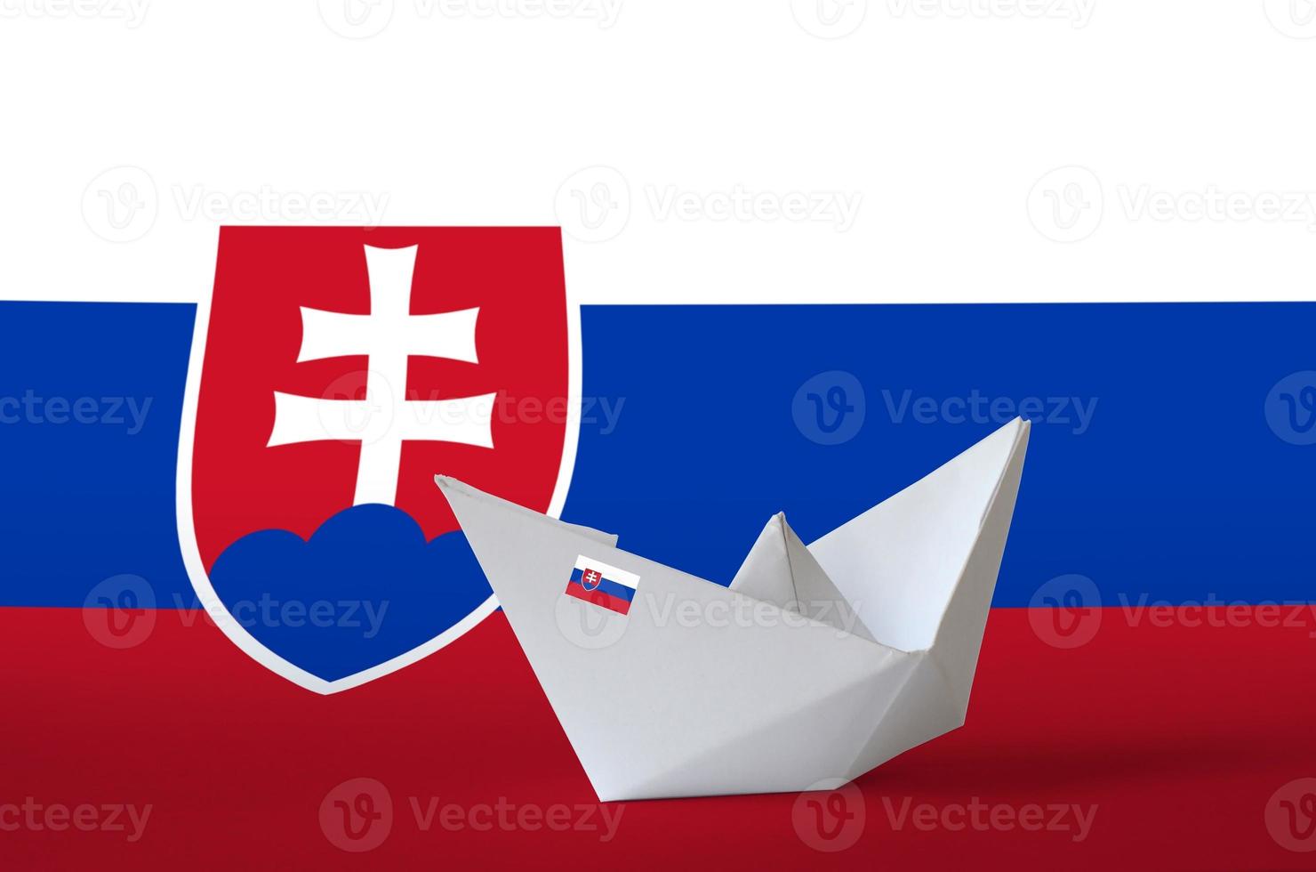 Slovakia flag depicted on paper origami ship closeup. Handmade arts concept photo