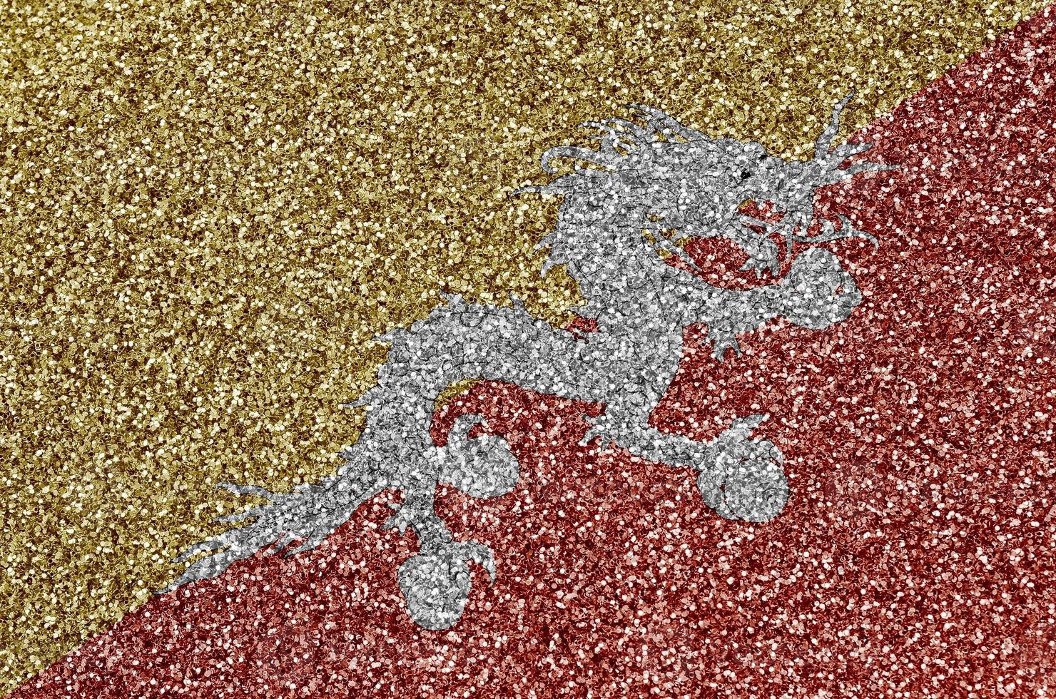 Bhutan flag depicted on many small shiny sequins. Colorful festival background for party photo