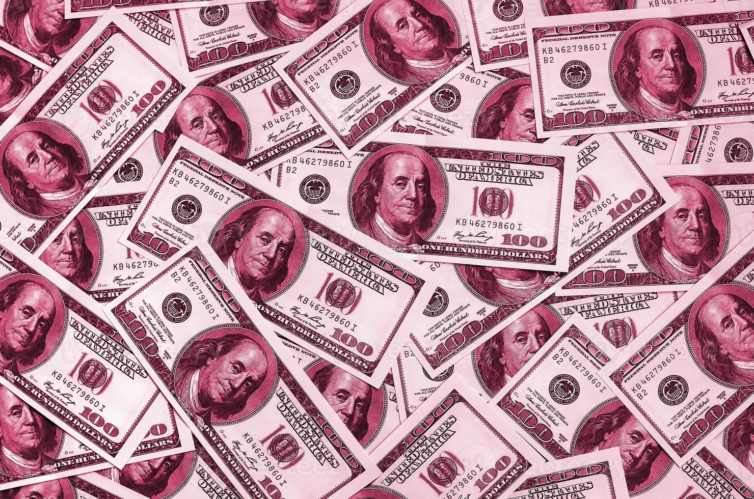 a-pile-of-one-hundred-us-banknotes-with-president-portraits-cash-of