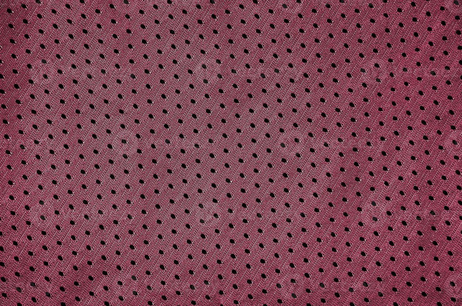 Sport Clothing Fabric Texture Background. Top View of Cloth Textile Surface. Image toned in Viva Magenta, color of the 2023 year photo