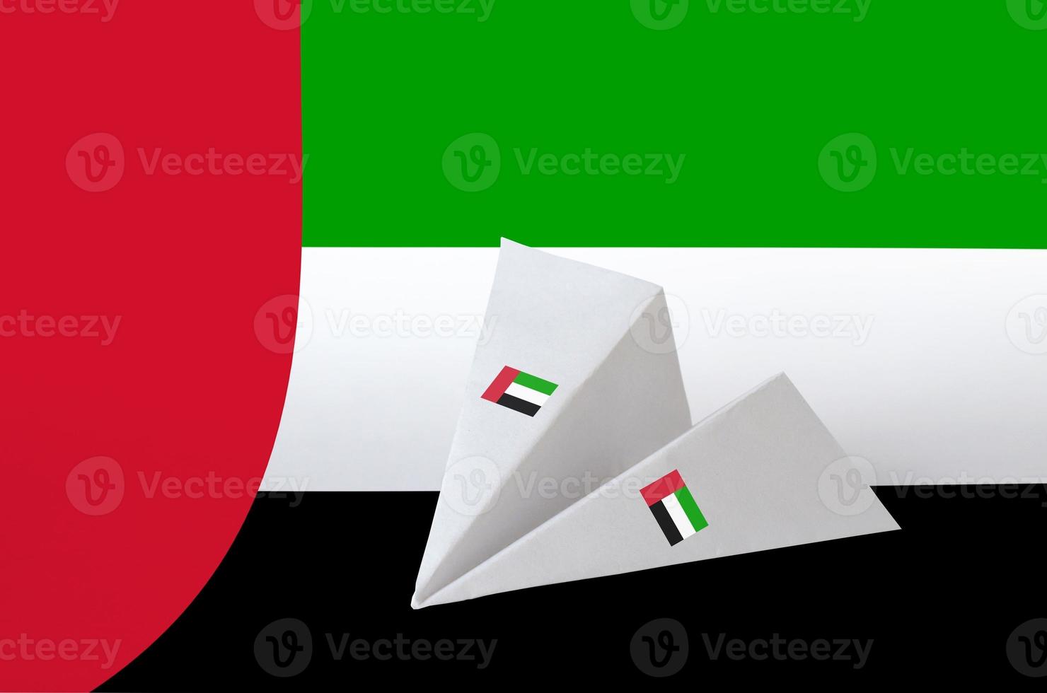 United Arab Emirates flag depicted on paper origami airplane. Handmade arts concept photo