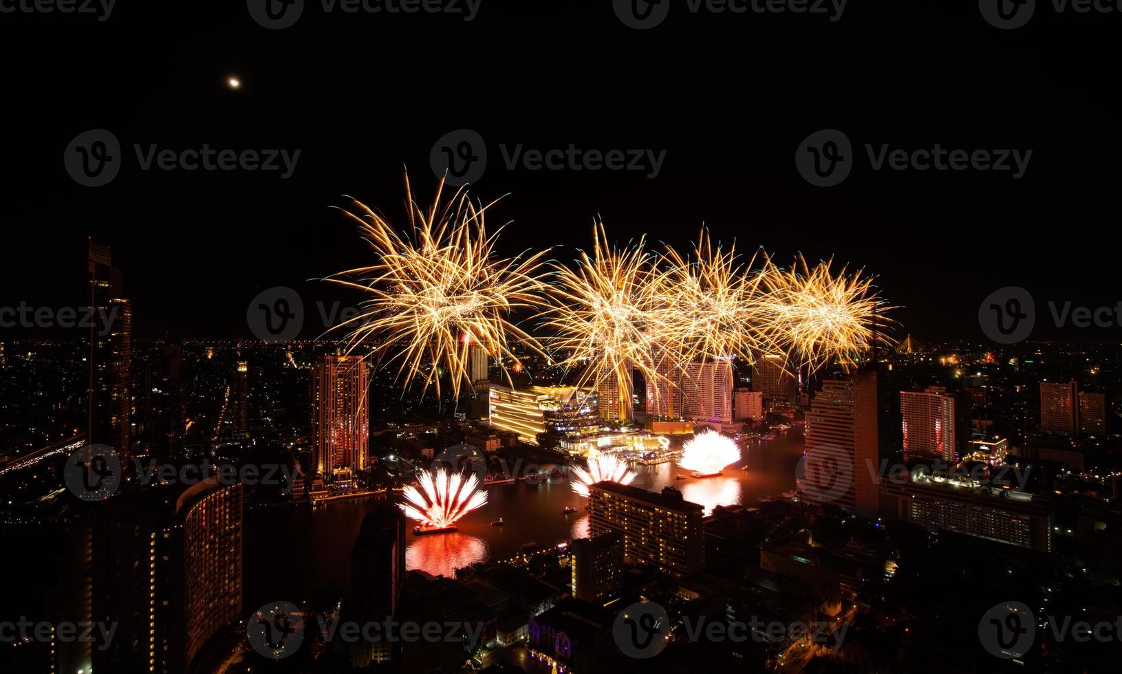 Spectacular fireworks display along the Chao Phraya River Bangkok, Thailand photo