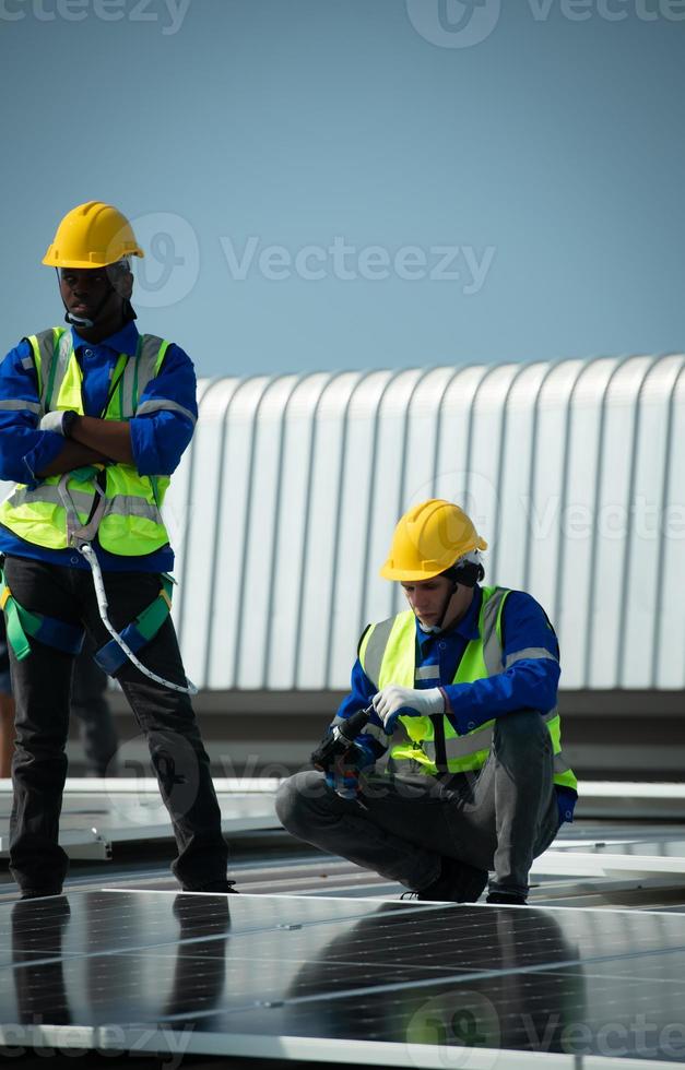 Engineer in charge of solar panel installation The installation of solar energy photo