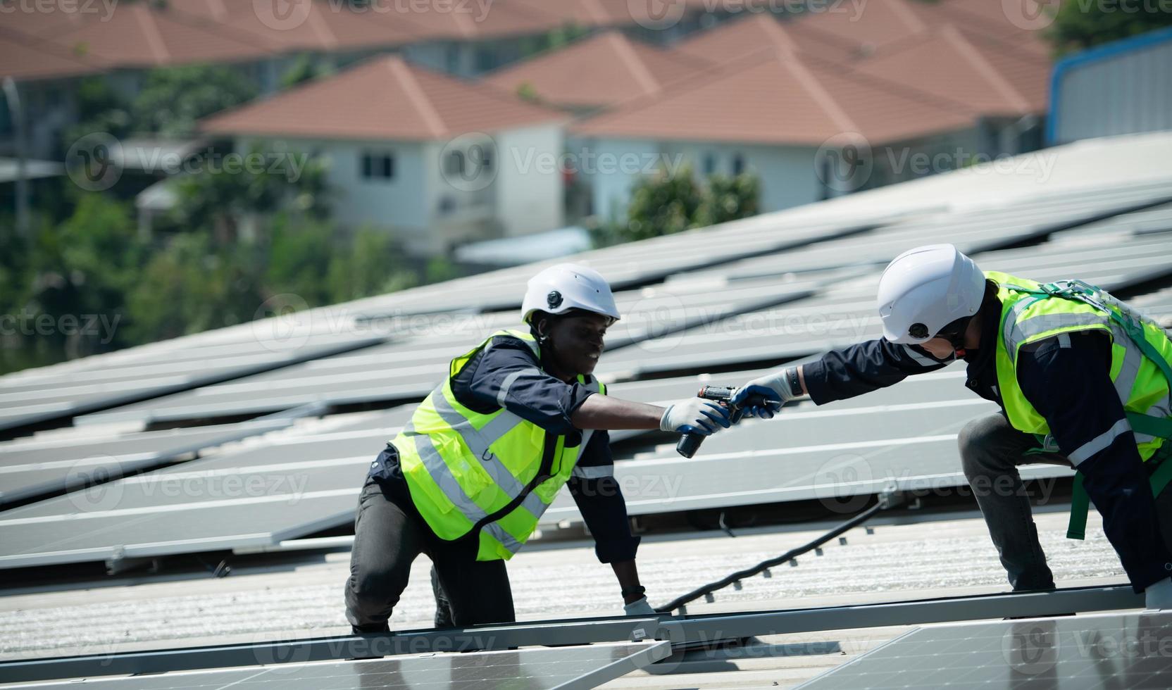 Engineer in charge of solar panel installation The installation of solar energy photo