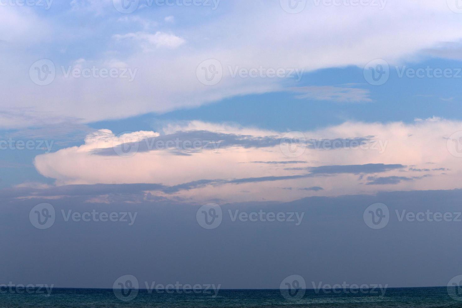 Rain clouds in the sky over the Mediterranean Sea in northern Israel. photo