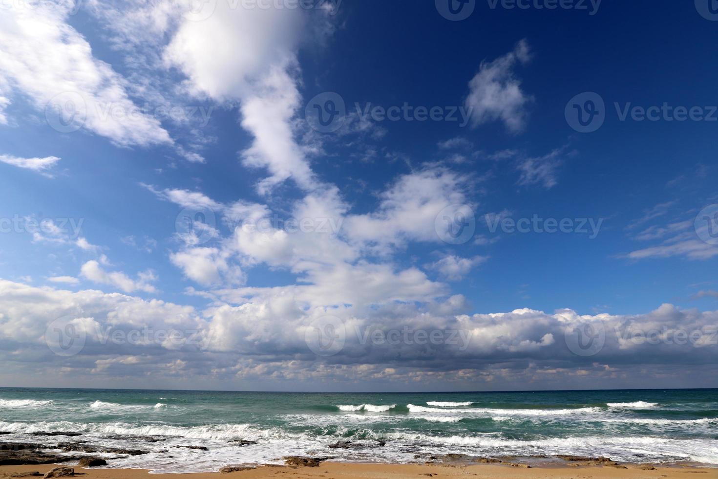 Rain clouds in the sky over the Mediterranean Sea in northern Israel. photo