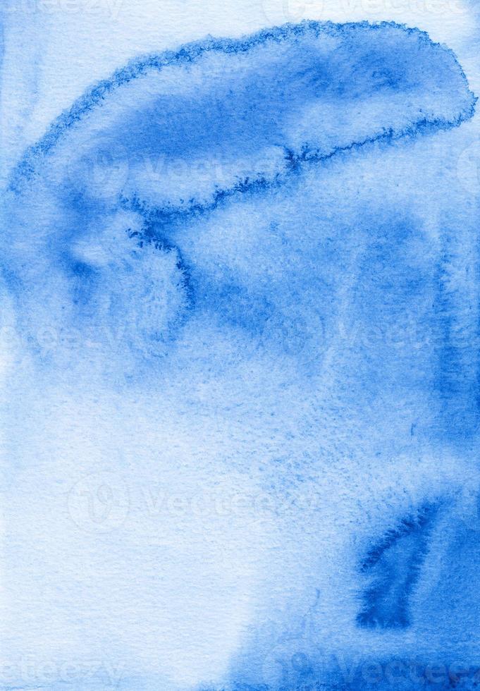 Watercolor liquid blue and white background texture. Hand painted watercolour backdrop. Stains on paper. photo