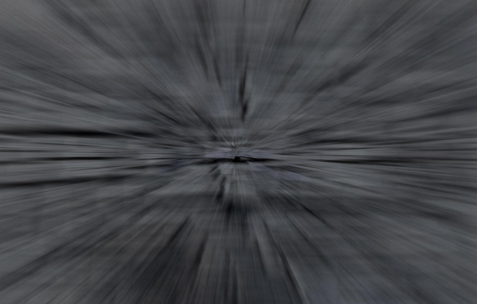 Zoom effect dark black abstract background with space photo