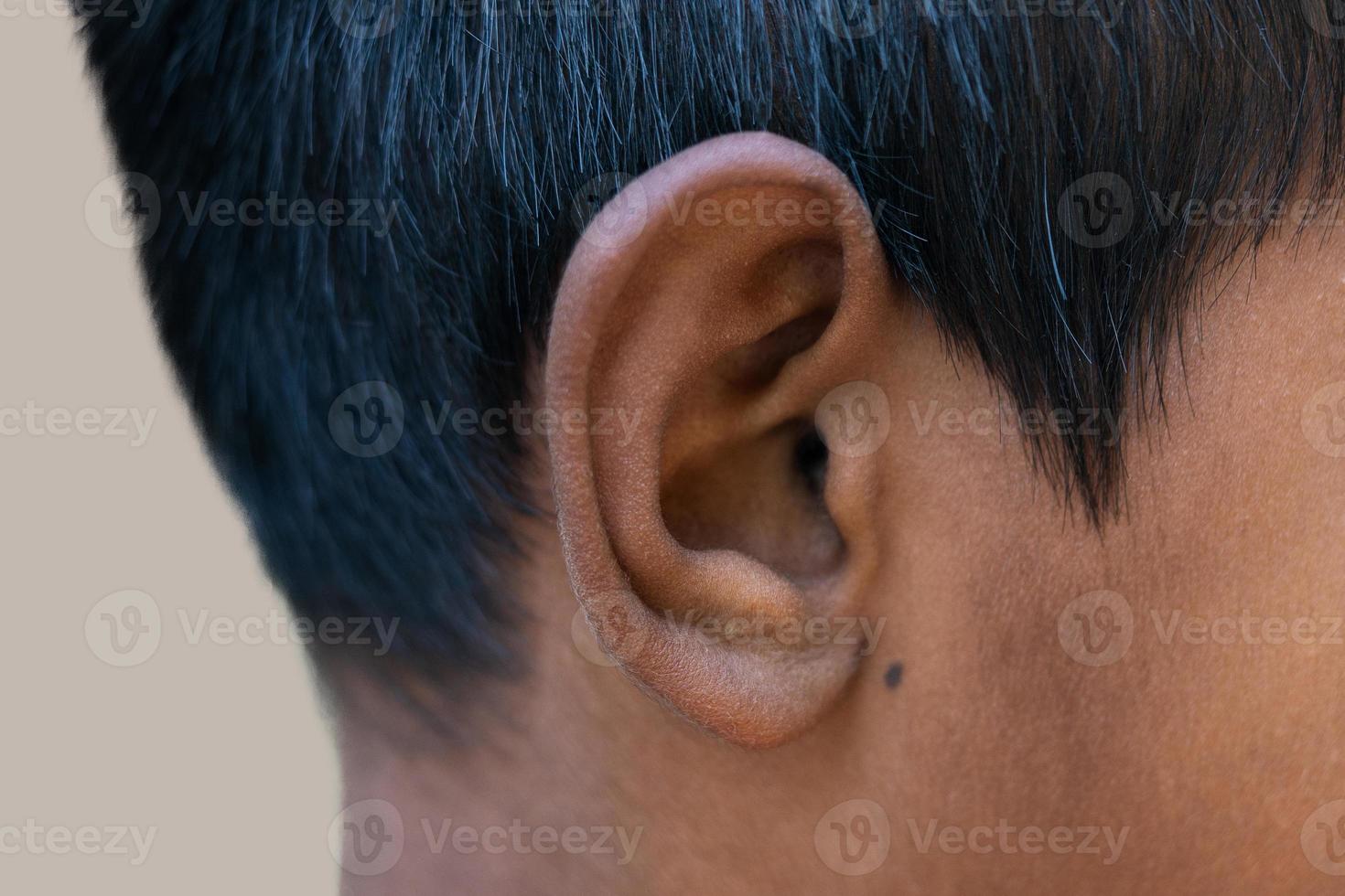 Human Ear - Close up of a man’s ear Its body part helps to hear sound