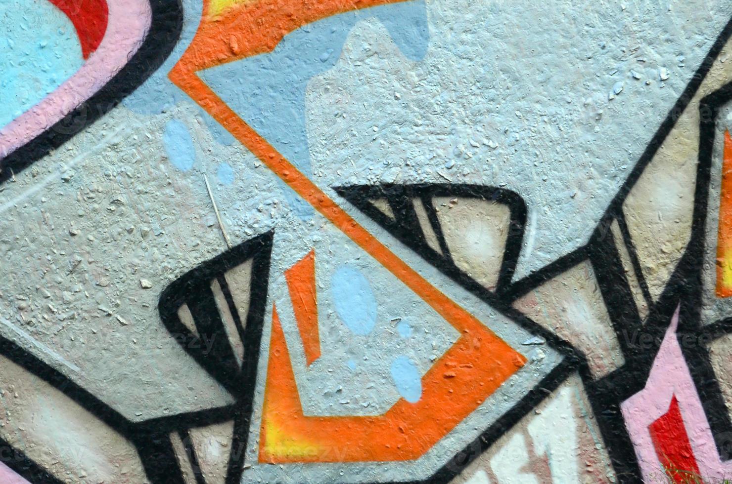 fragmento de dibujos de graffiti. la antigua muralla decorada con manchas de pintura al estilo de la cultura del arte callejero. textura de fondo de color foto