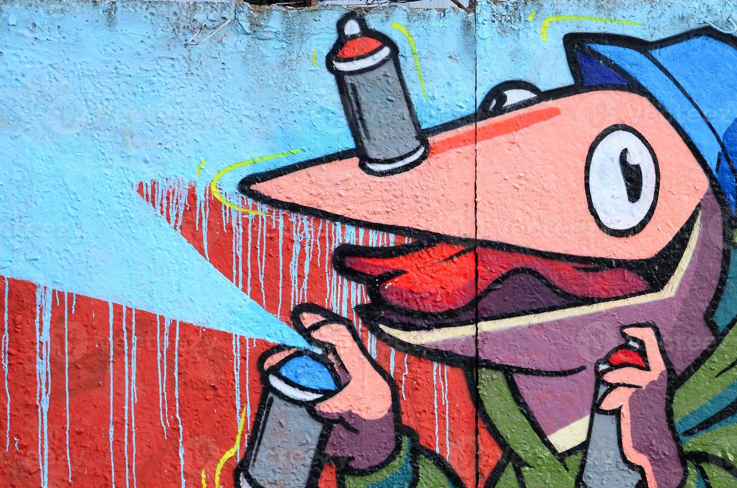 fragmento de dibujos de graffiti. la antigua muralla decorada con manchas de pintura al estilo de la cultura del arte callejero. textura de fondo de color foto