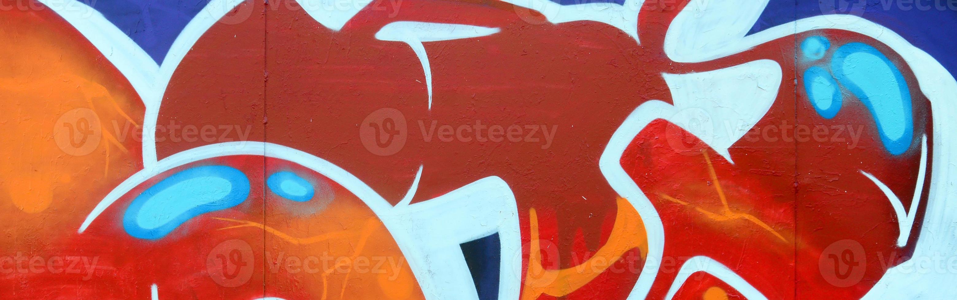 fragmento de dibujos de graffiti. la antigua muralla decorada con manchas de pintura al estilo de la cultura del arte callejero. textura de fondo de color foto