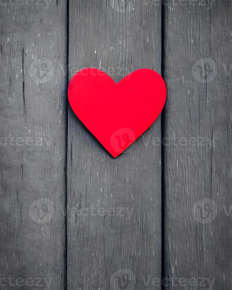 Red Love Heart Shaped Sticker on Wooden Table photo