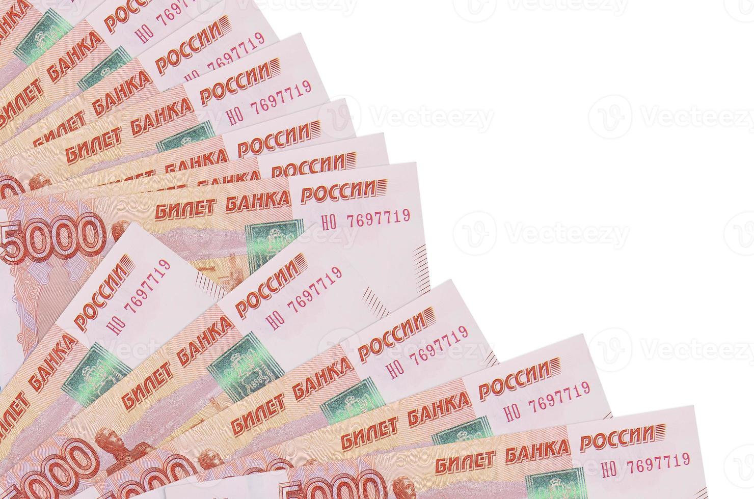5000 russian rubles bills lies isolated on white background with copy space stacked in fan close up photo
