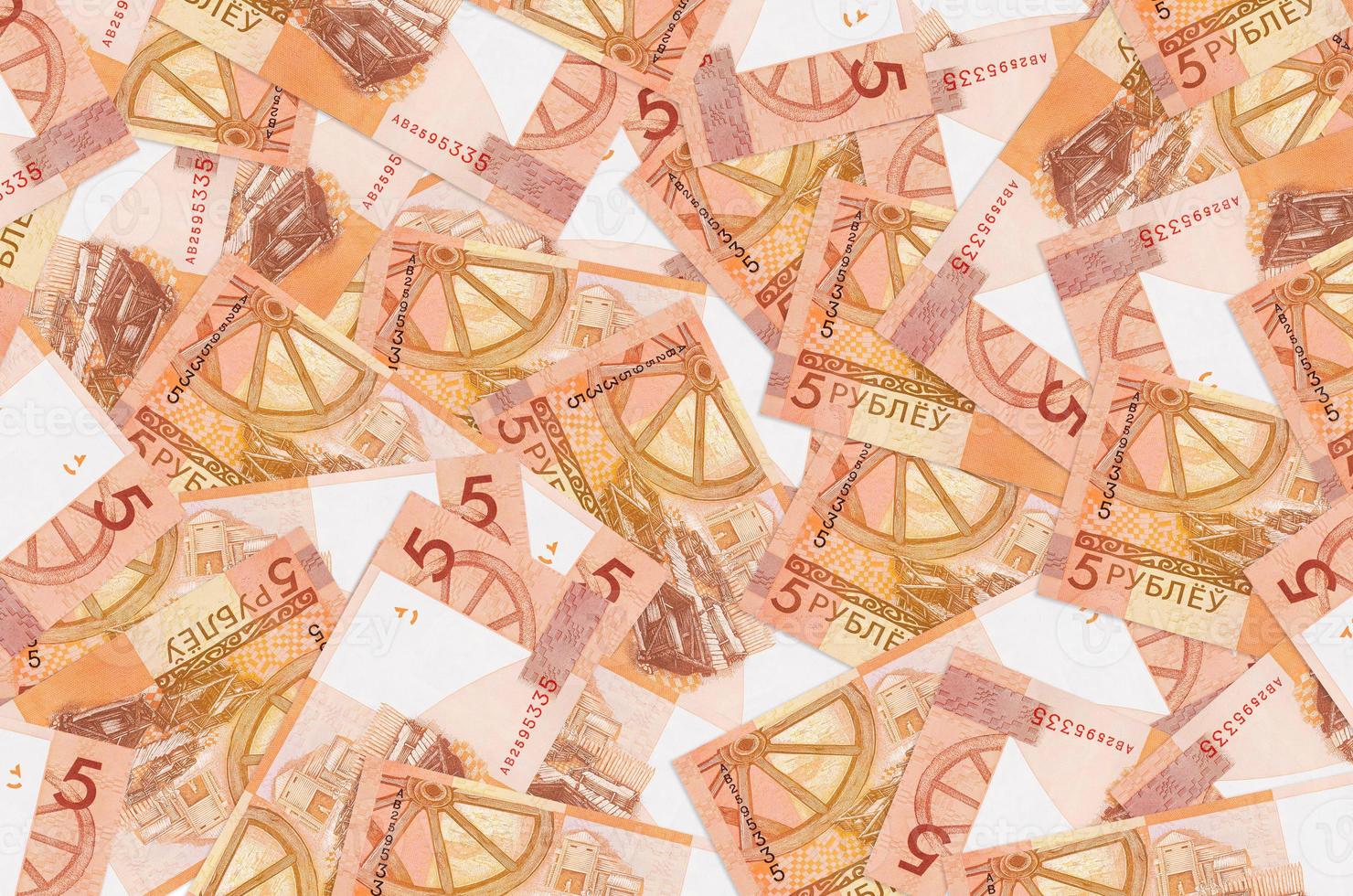 5 Belorussian rubles bills lies in big pile. Rich life conceptual background photo