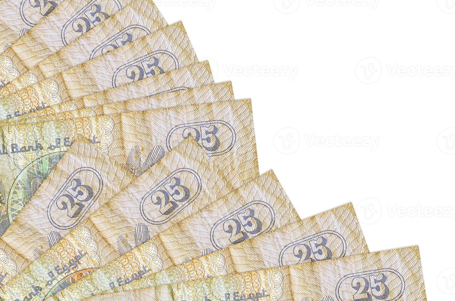 25 Egyptian piastres bills lies isolated on white background with copy space stacked in fan close up photo