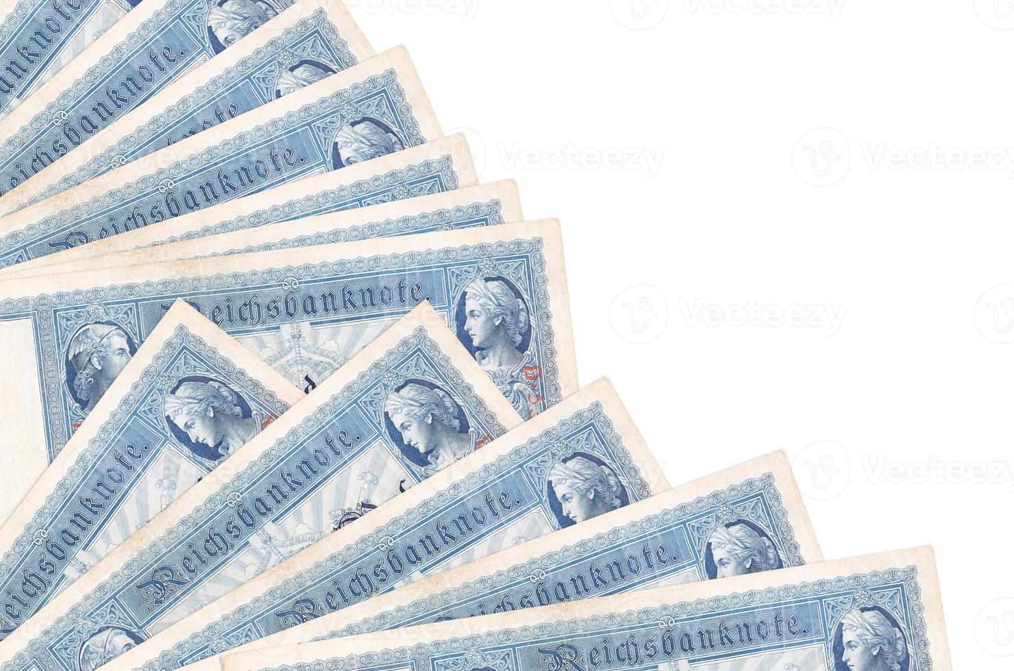 100 Reich marks bills lies isolated on white background with copy space stacked in fan close up photo