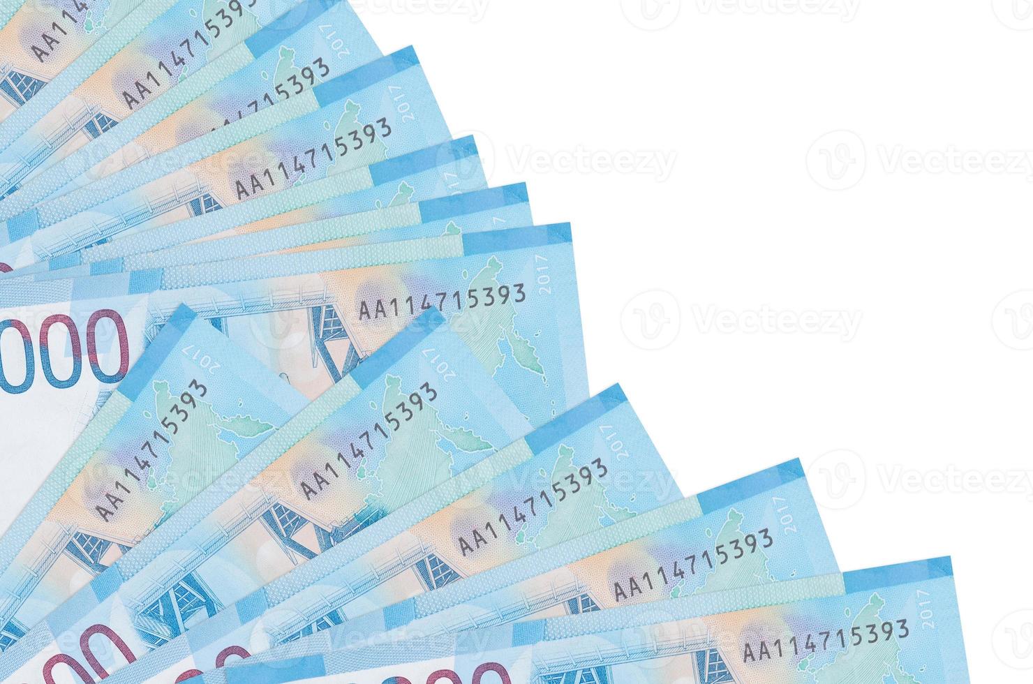 2000 russian rubles bills lies isolated on white background with copy space stacked in fan close up photo