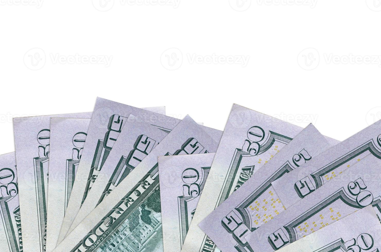 50 US dollars bills lies on bottom side of screen isolated on white background with copy space. Background banner template photo