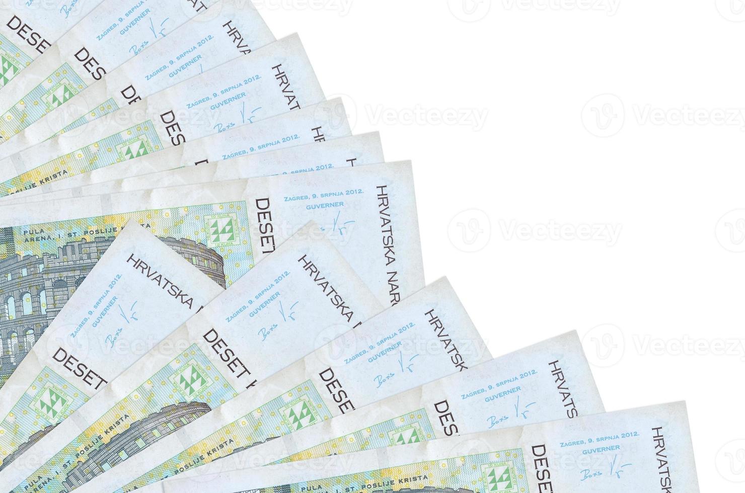 10 Croatian kuna bills lies isolated on white background with copy space stacked in fan close up photo
