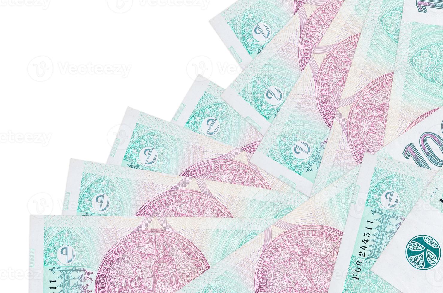 100 Czech korun bills lies in different order isolated on white. Local banking or money making concept photo
