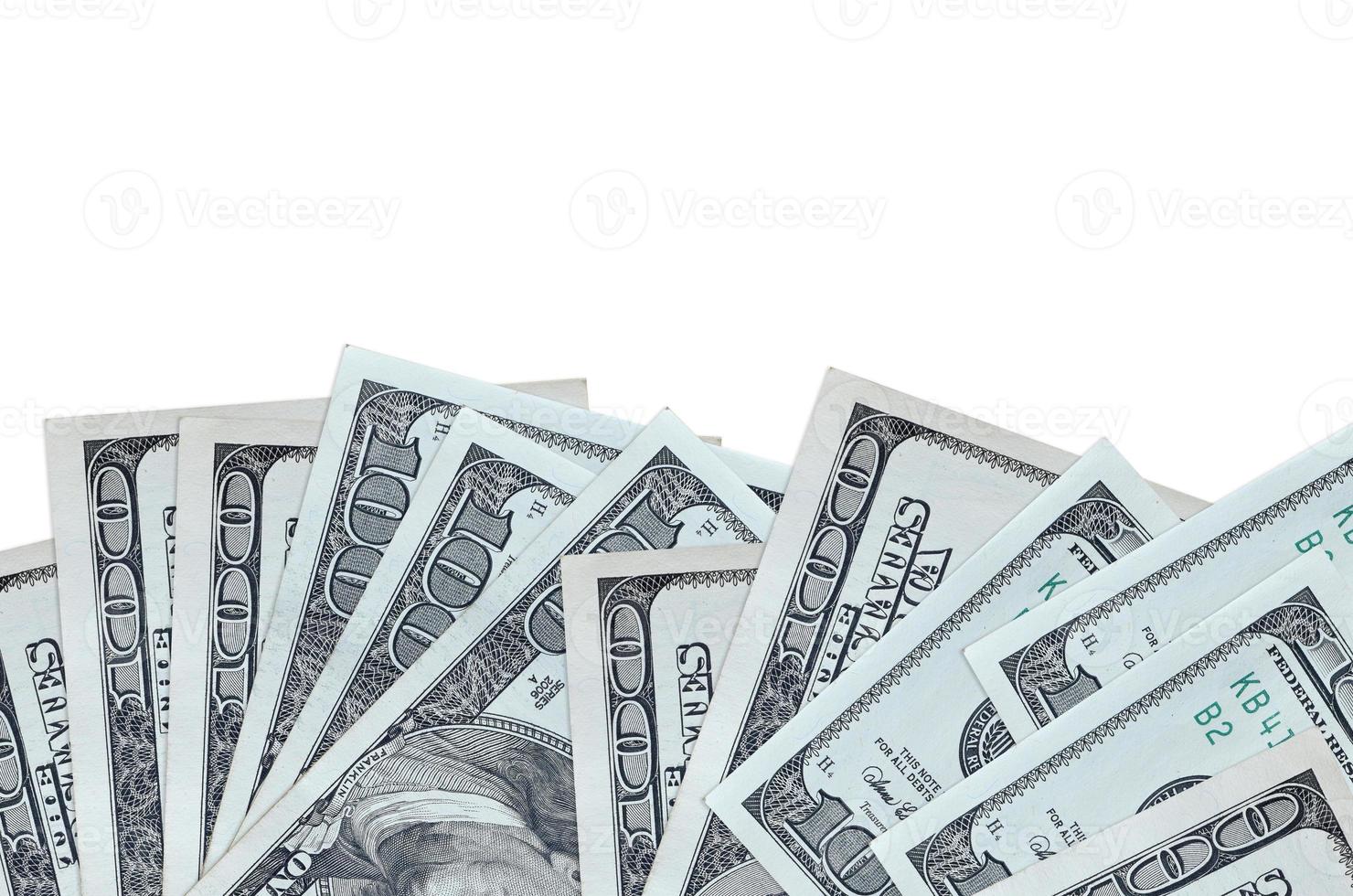 100 US dollars bills lies on bottom side of screen isolated on white background with copy space. Background banner template photo