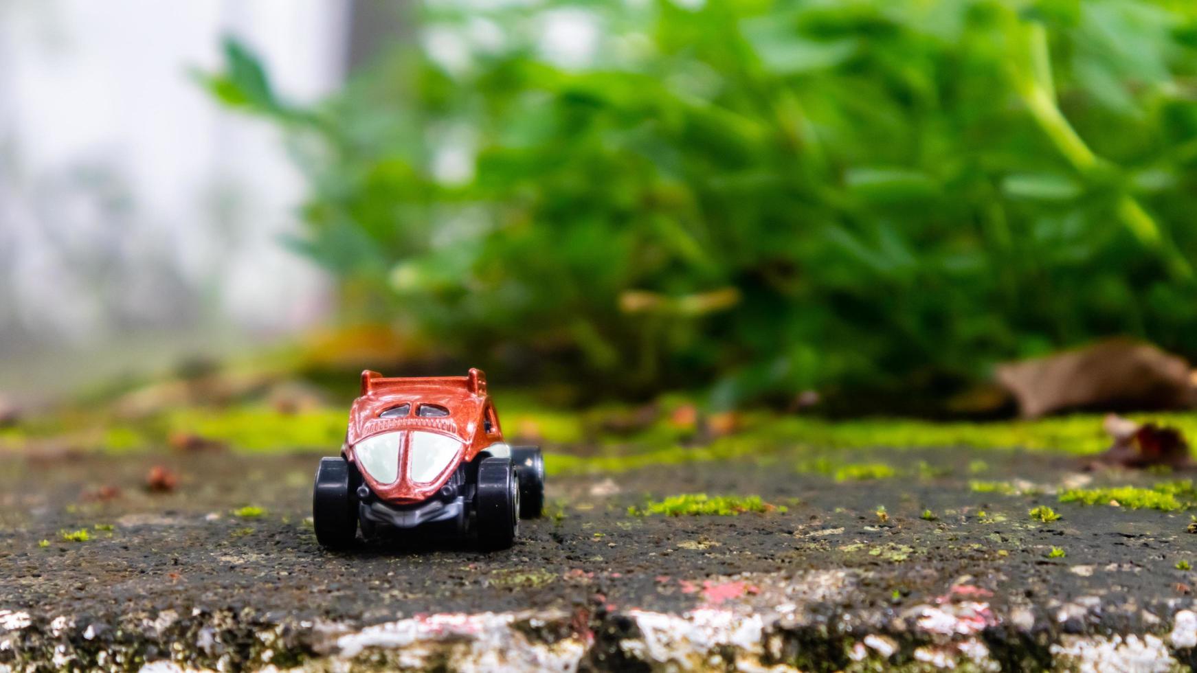 Minahasa, Indonesia  December 2022, the toy car in nature photo