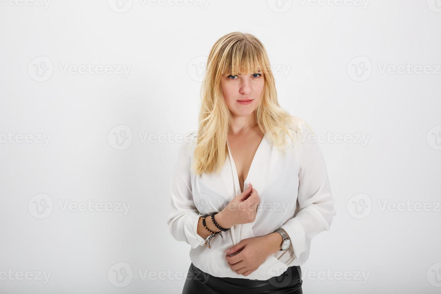 close up portrait of blonde girl model in white wool sweater on white background in studio photo